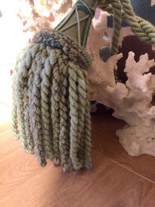 Abrazadera de cortina antigua