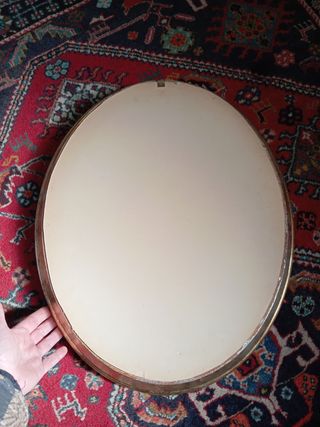 Quadro ovale con monete
