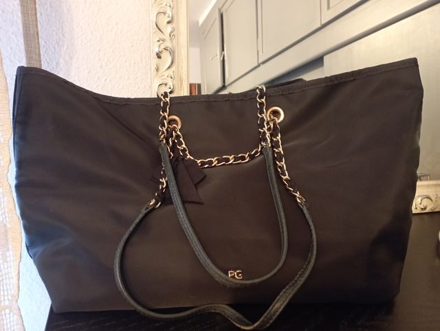 Bolso Purificación García negro Reversible.