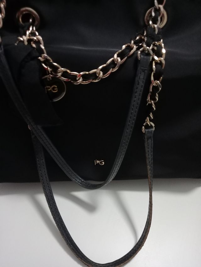 Bolso Purificación García negro Reversible.