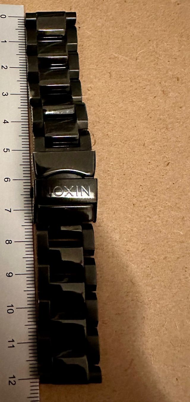 correa metalica Nixon