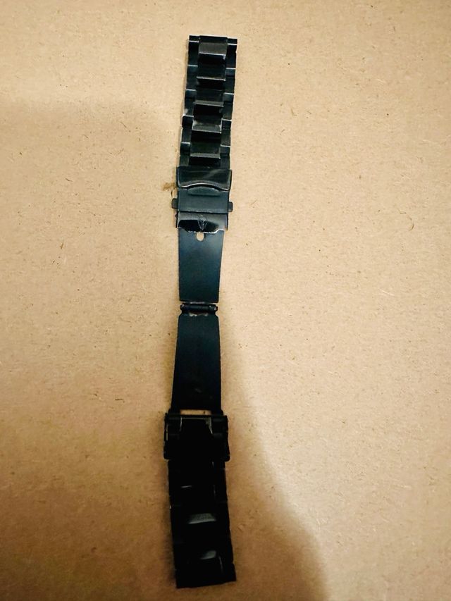 correa metalica Nixon