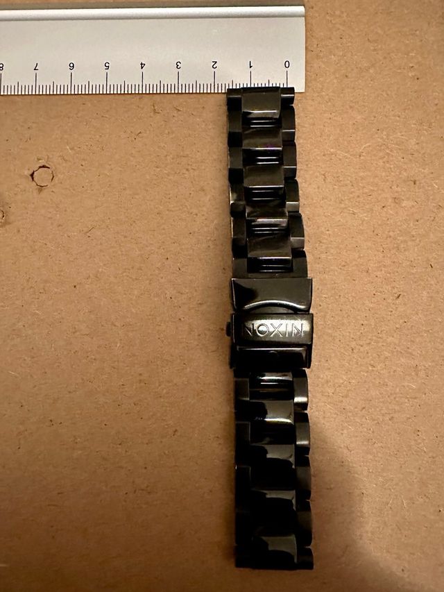 correa metalica Nixon