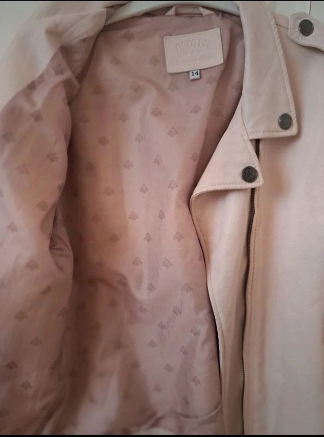 Cazadora biker rosa Brotes