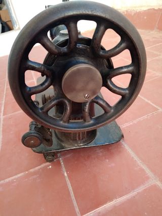 Cabezal antiguo de máquina de coser