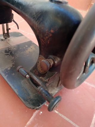 Cabezal antiguo de máquina de coser