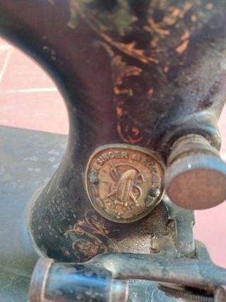 Cabezal antiguo de máquina de coser