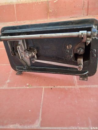 Cabezal antiguo de máquina de coser