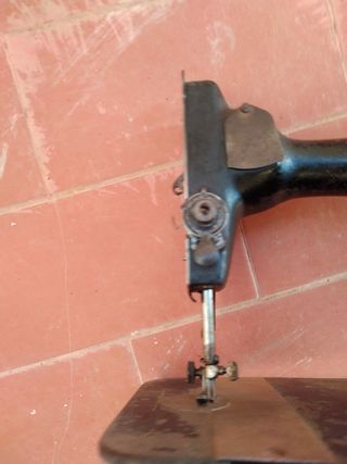 Cabezal antiguo de máquina de coser