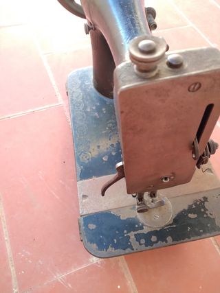 Cabezal antiguo de máquina de coser