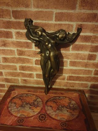 Figura de bronce