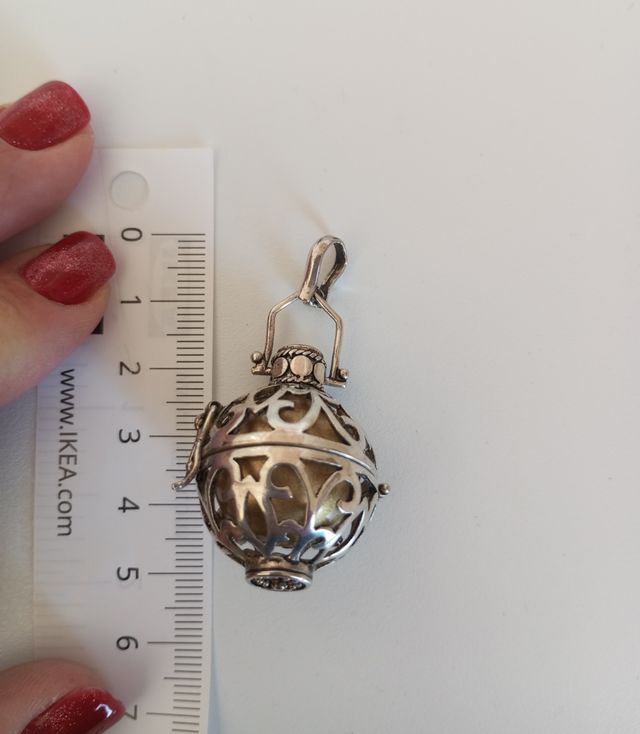 Llamador de ángeles de plata