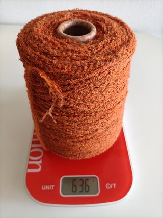 Rocca lana bouclé colore arancio