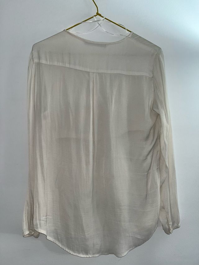 blusa larga en crudo con bolsillos