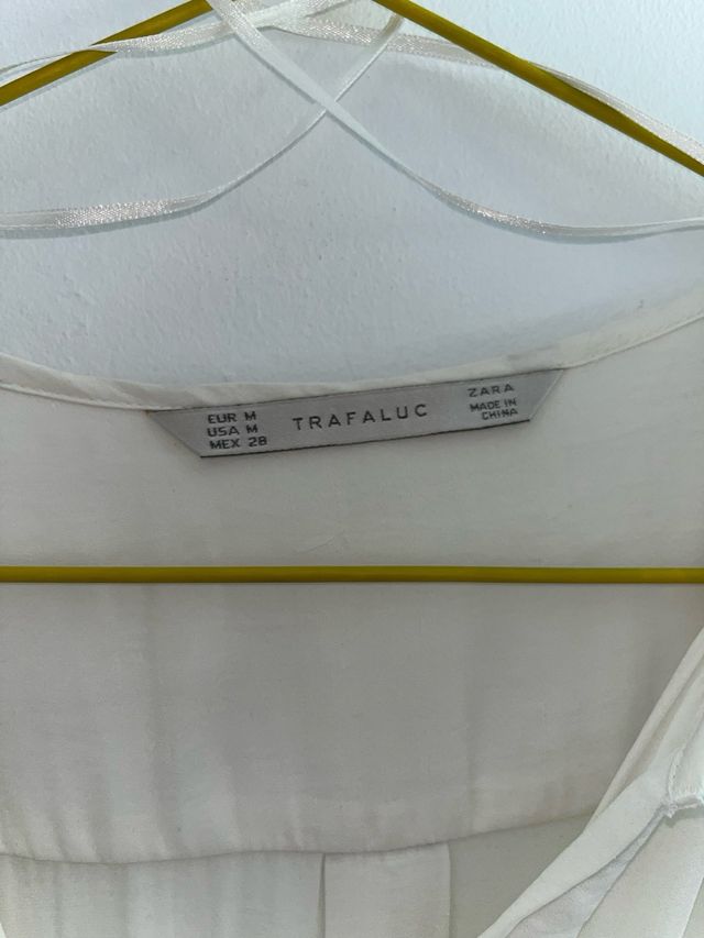 blusa larga en crudo con bolsillos