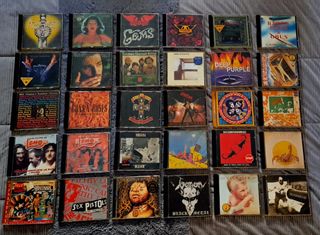 30 CD'S DE ROCK + MUEBLE - No se venden sueltos