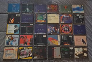 30 CD'S DE ROCK + MUEBLE - No se venden sueltos