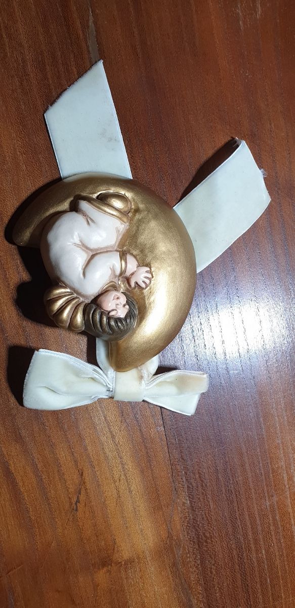 Formella "Thun" con Angelo sulla Luna