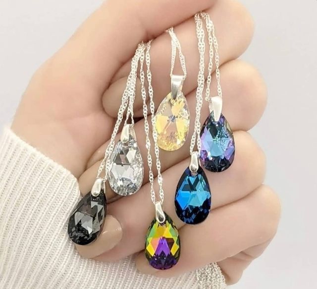 SWAROVSKI. Colgante. Pendientes.