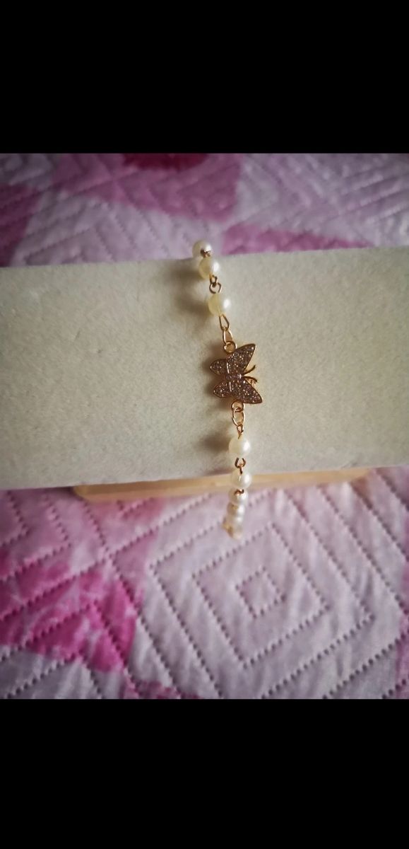 Braccialetto perle farfalla