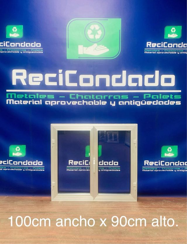 Nº52. Ventana abatible de aluminio gris.