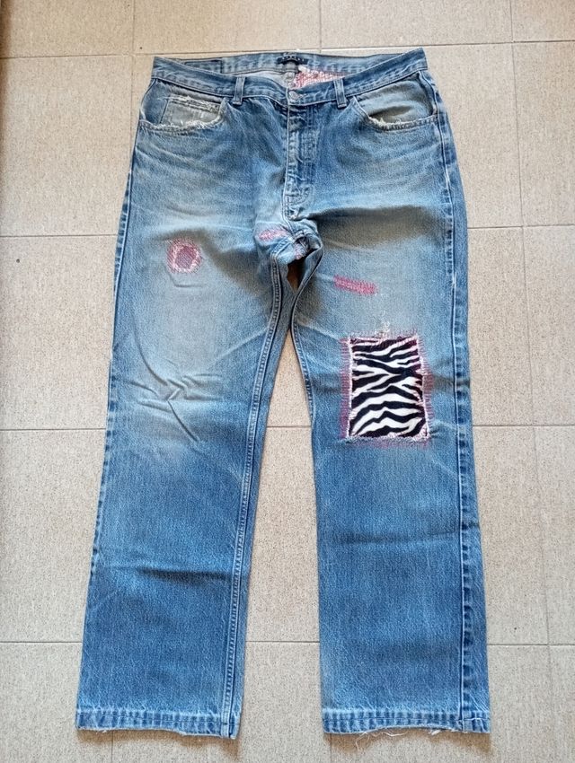 Jeans uomo con toppe