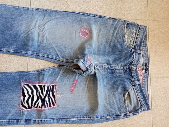 Jeans uomo con toppe