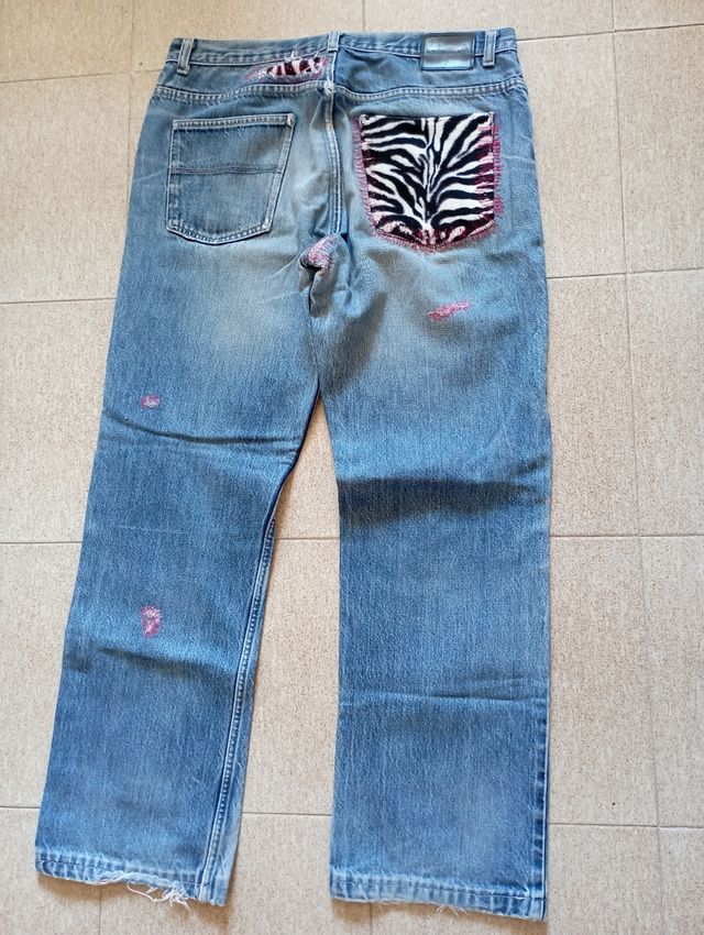 Jeans uomo con toppe