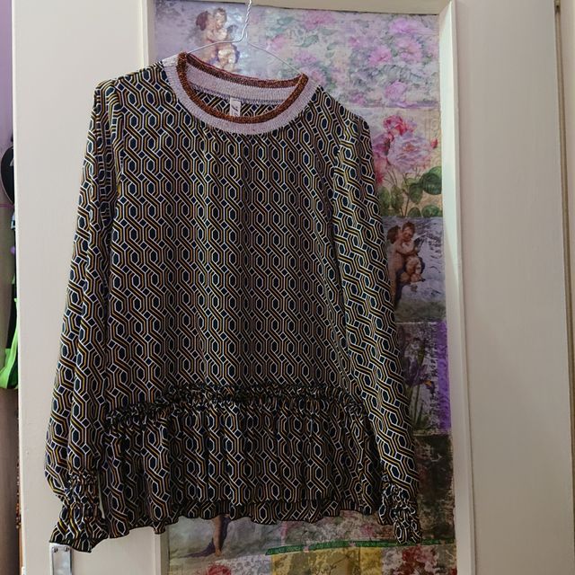 Blusa motivo geometrico 