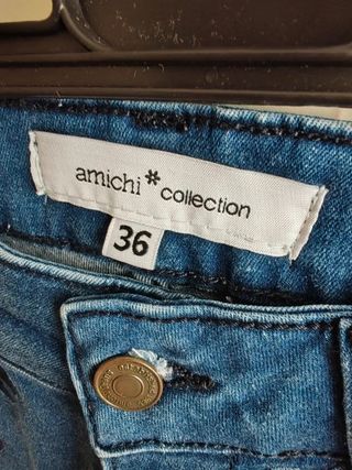 Pantalón vaquero flare mujer. AMICHI