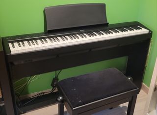 Piano digital Kawai ES 110 con soporte,pedales,etc