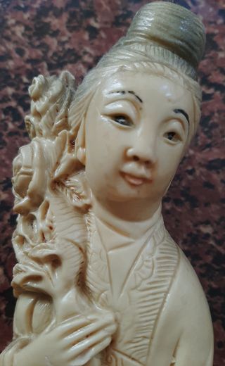 Pareja de figuras chinas en resina