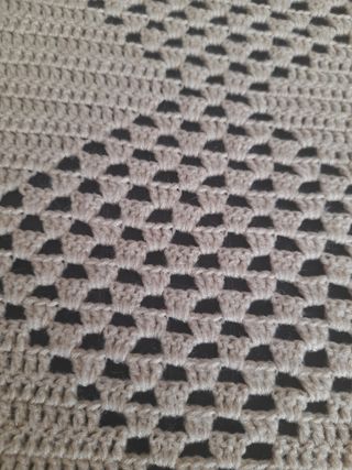 Colcha ó cortina beig.