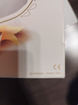 Muñeca famosa primera comunion