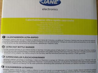 Calienta biberones Jané nuevo + adaptador de coche