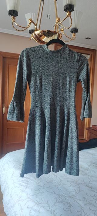 Vestido vuelo gris.Sfera.S.Perkns