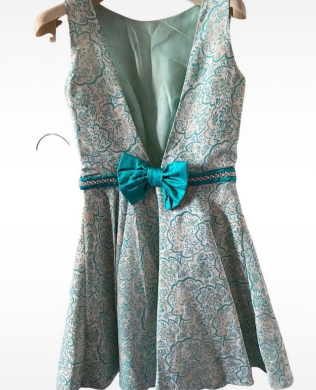 vestido espalda al aire y falda vuelo