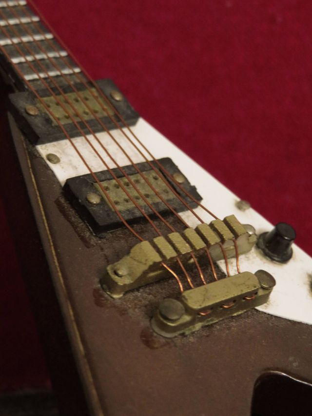 Mini guitarra eléctrica