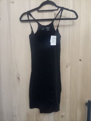 Leggins y camiseta de tirantes negro
