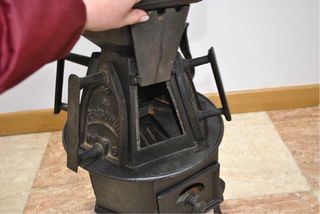 Antiguo calienta planchas de hierro