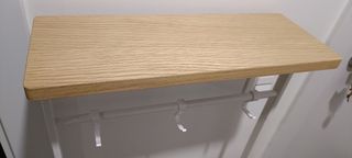 Paragüero colgante con vacía bolsillos