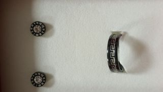 Anillo pulsera y pendientes de acero