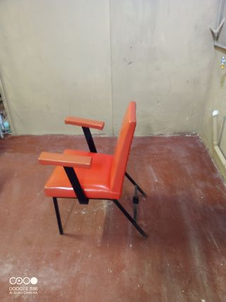 Silla antigua peluquería.