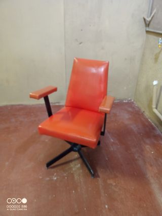 Silla antigua peluquería.