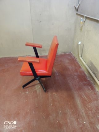 Silla antigua peluquería.