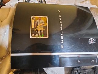 PlayStation 3 Sony más tres juegos.