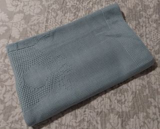 Mantita de bebe niño de lana en punto