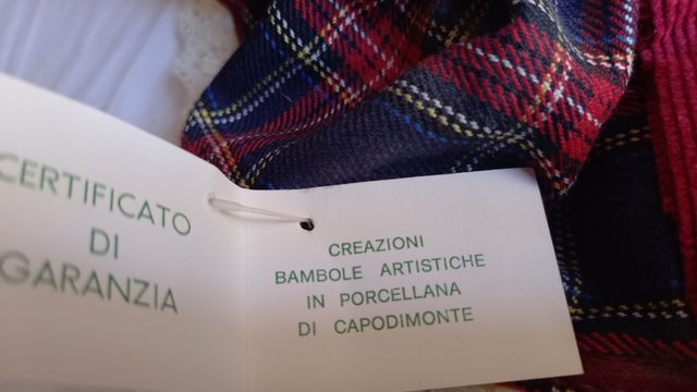 Bambola da collezione in porcellana