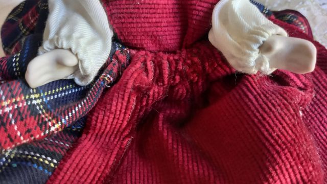 Bambola da collezione in porcellana