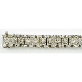 Pulsera en Oro Blanco, articulada, con 99 Diamante